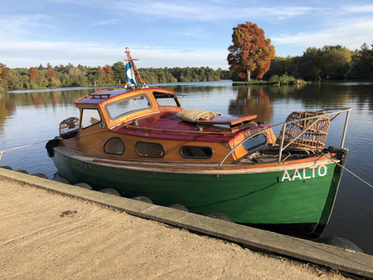 22ft traditional clinker cabin motor boat Marine Film Services